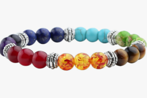 Round blue and red gemstone beads with silver spacers on a chakra-style bracelet, accented by turquoise and amber-yellow stones.
